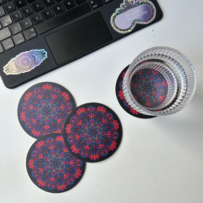 black background and colorful mandala coaster