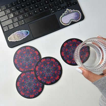 black background and colorful mandala coaster