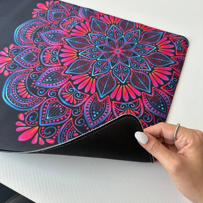 Colorful mandala with black background desk pad