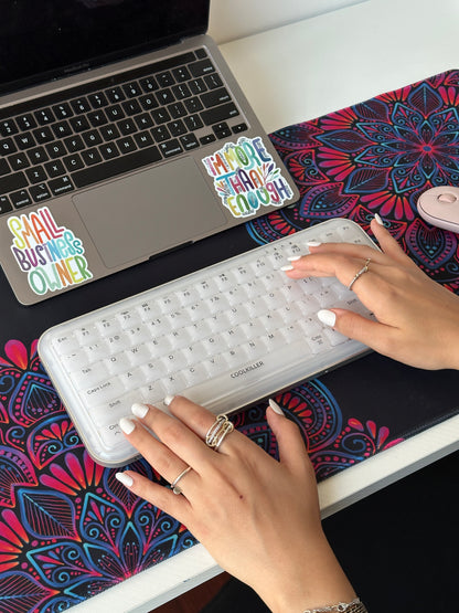 Colorful mandala with black background desk pad