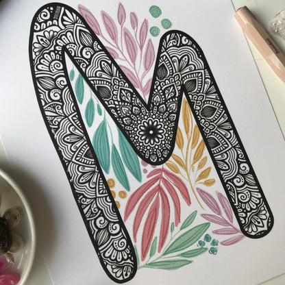 Mandala M letter with plant doodle