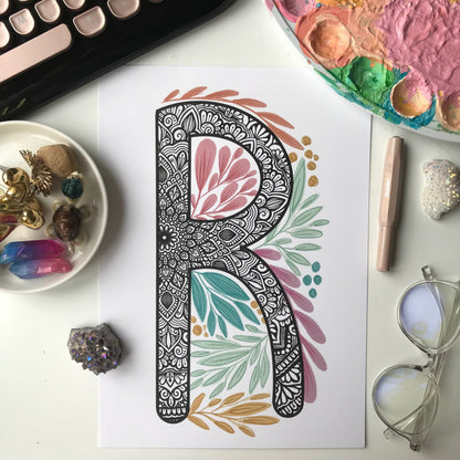 mandala R letter with plant doodle