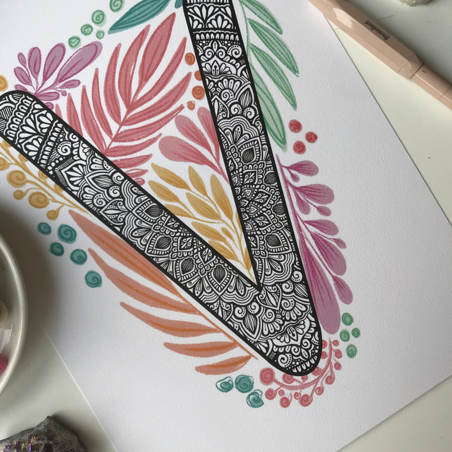 Mandala V letter with plant doodle