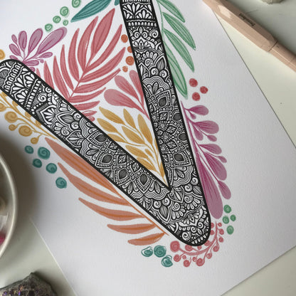 Mandala V letter with plant doodle