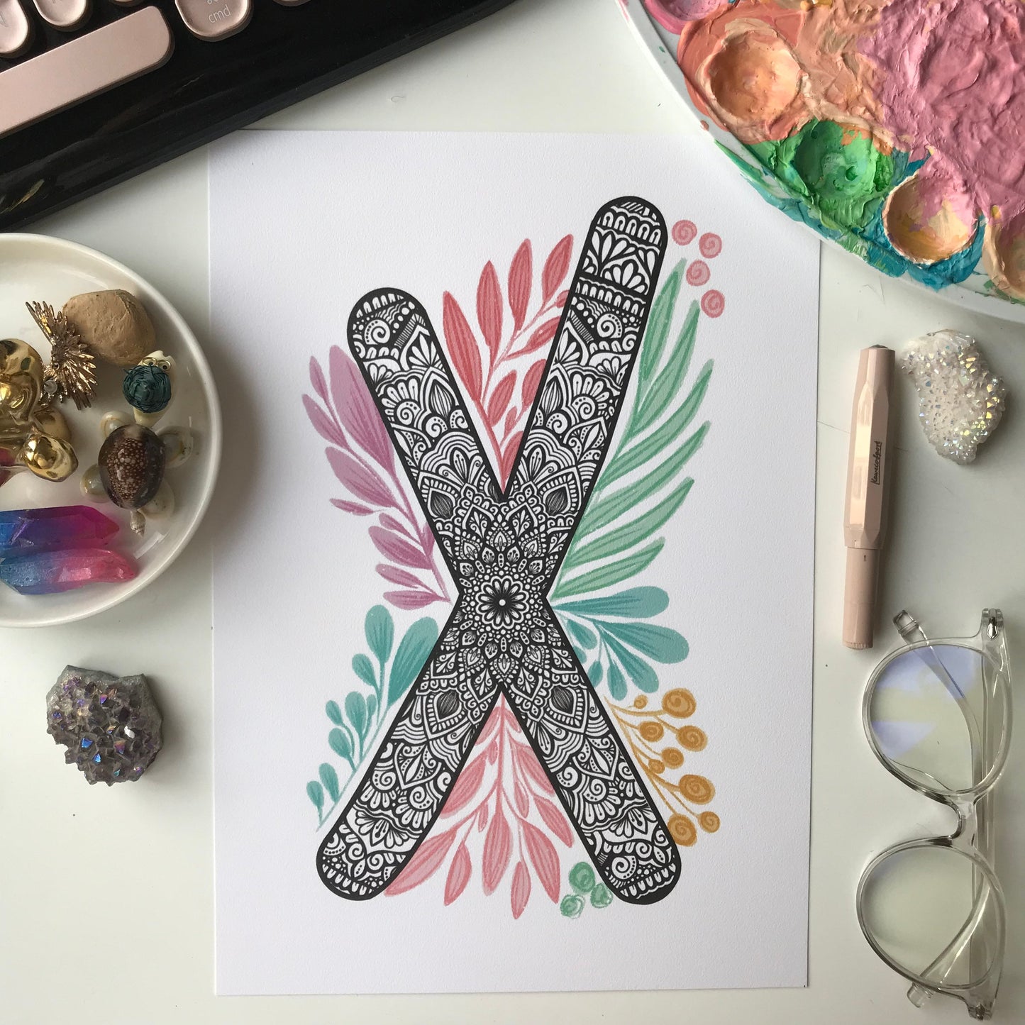 mandala X letter with plant doodle