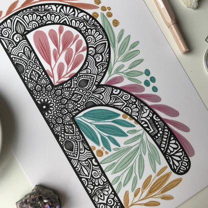 mandala R letter with plant doodle