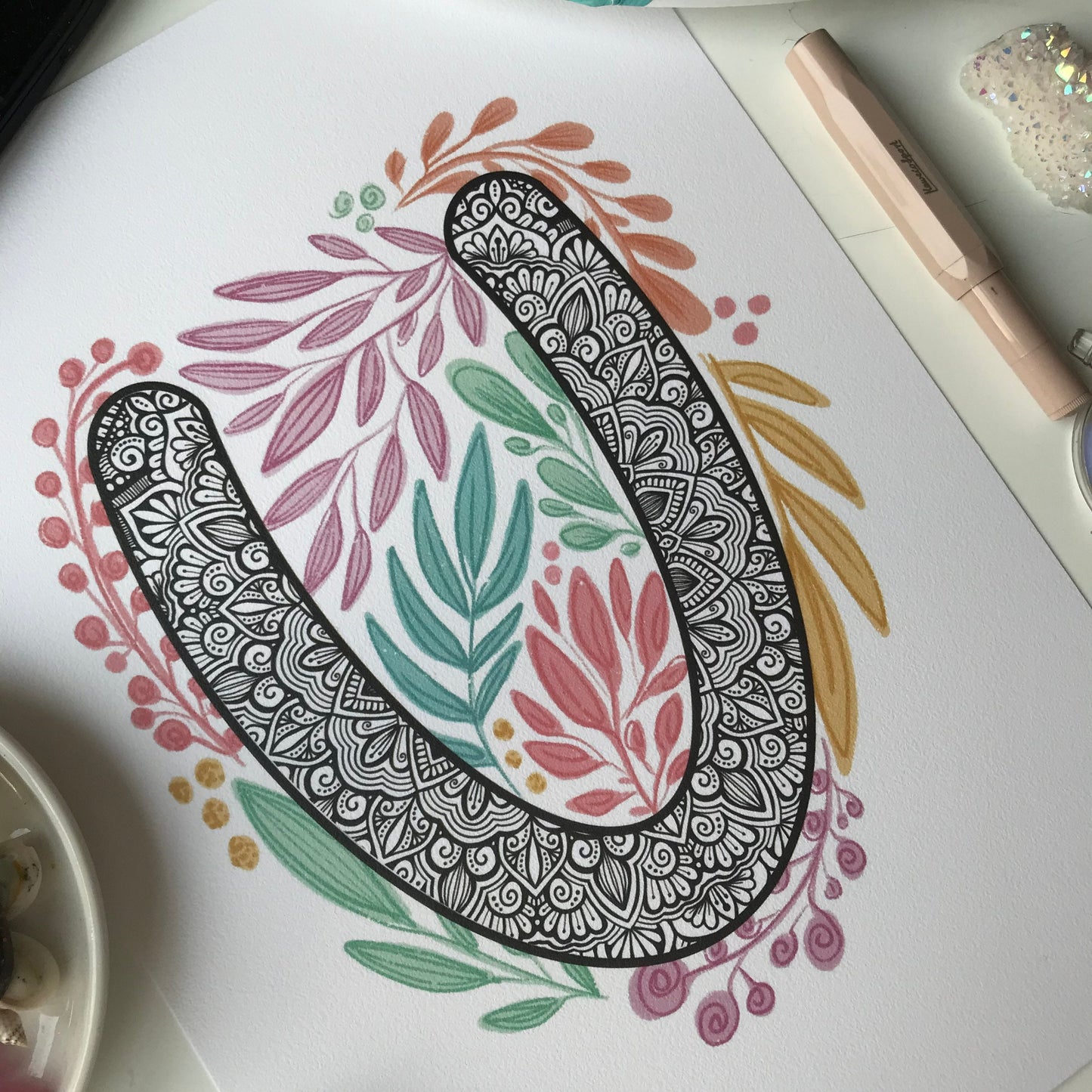 mandala U with plant doodle