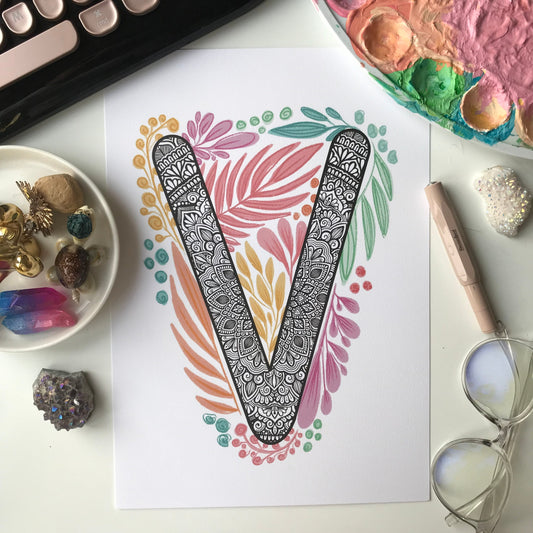 Mandala V letter with plant doodle